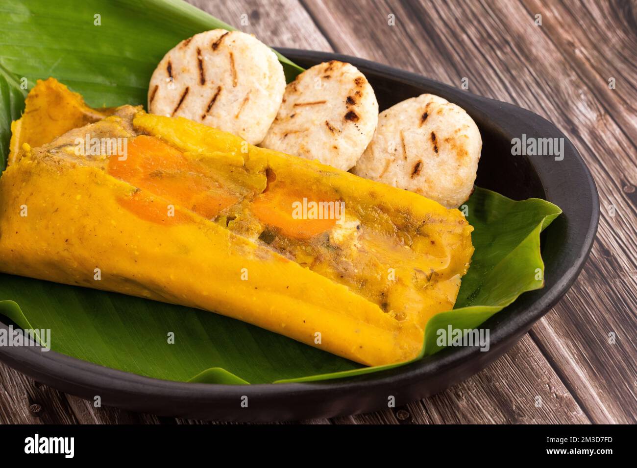 Receta de tamales colombianos con hojas de plátano al vapor gastronomía tradicional de