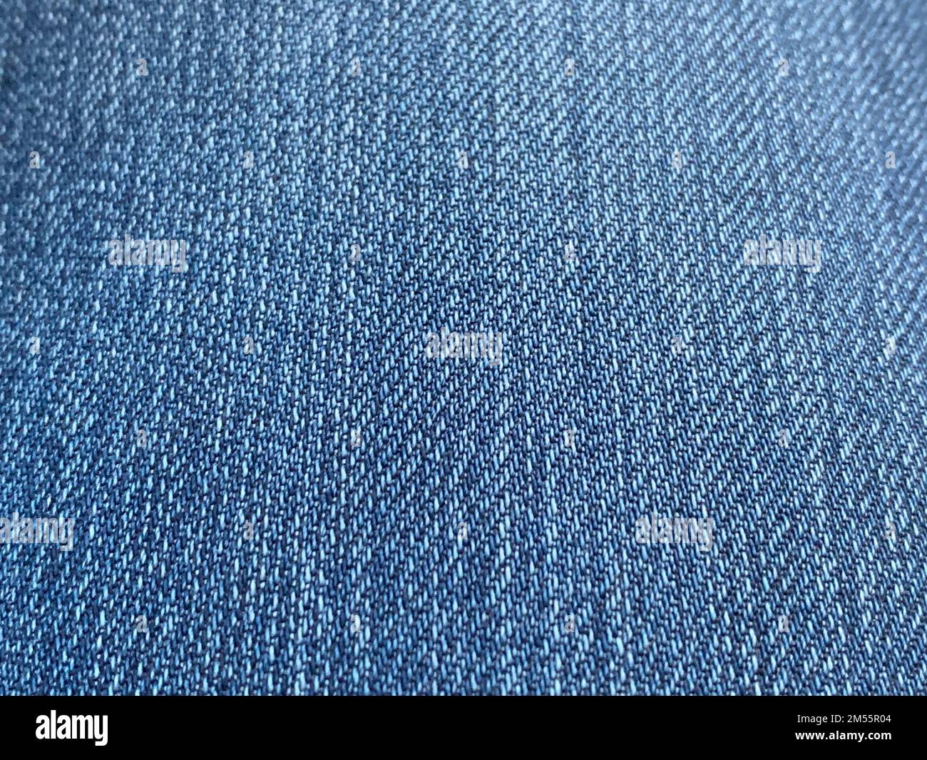 Blue Jeans Tela de algodón de tela de fondo foto de primer plano Foto de stock
