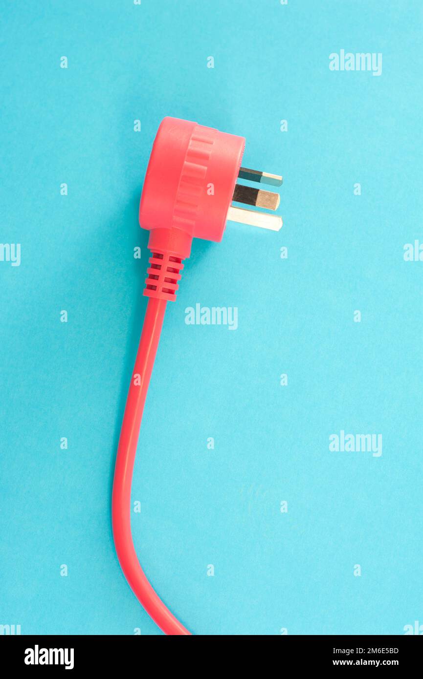 Cable eléctrico integrado rojo y enchufe Foto de stock