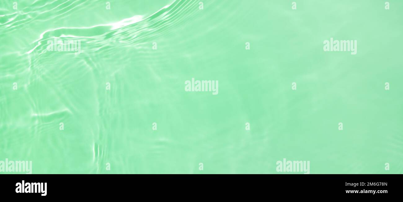 banner fondo transparente verde claro superficie onda de agua textura Foto de stock