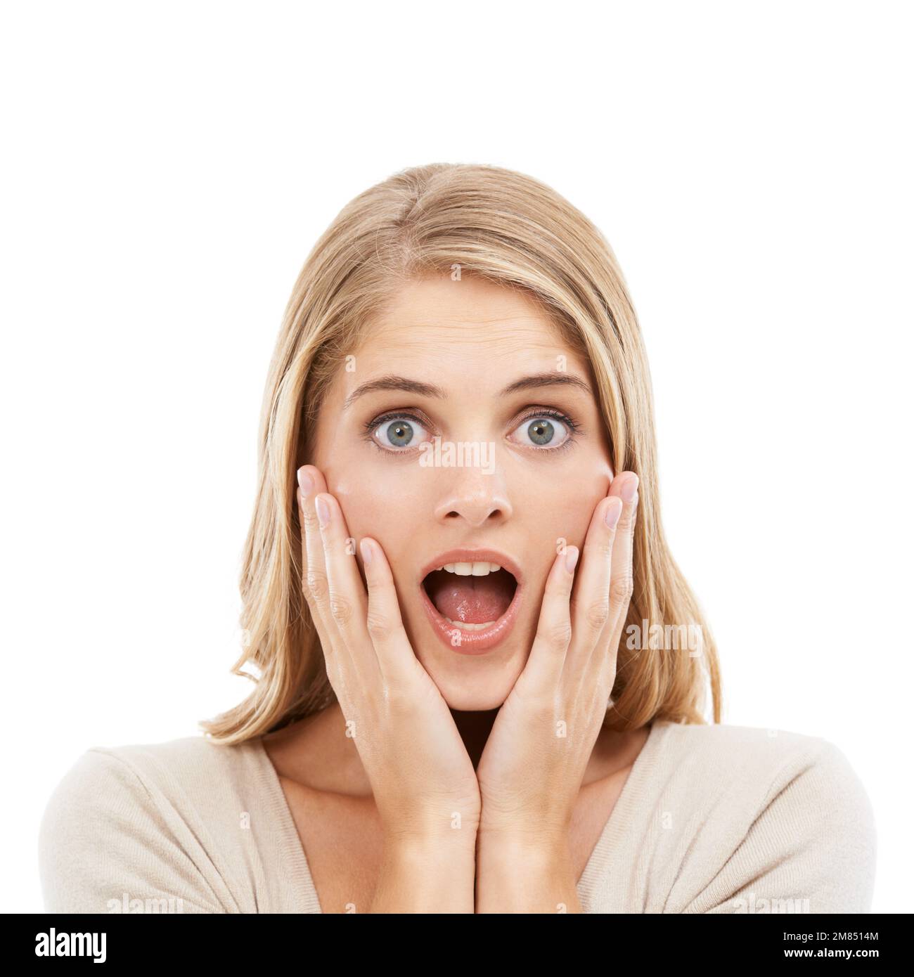 Estoy realmente sorprendido. Retrato de estudio de una mujer rubia de  aspecto impactante aislado en blanco Fotografía de stock - Alamy