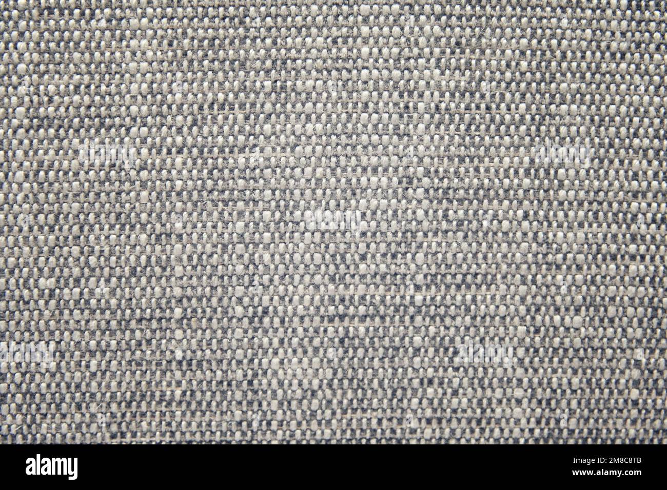 Textura de patrón textil gris abstracto de la tela de los muebles. Texturas de algodón industrial Foto de stock