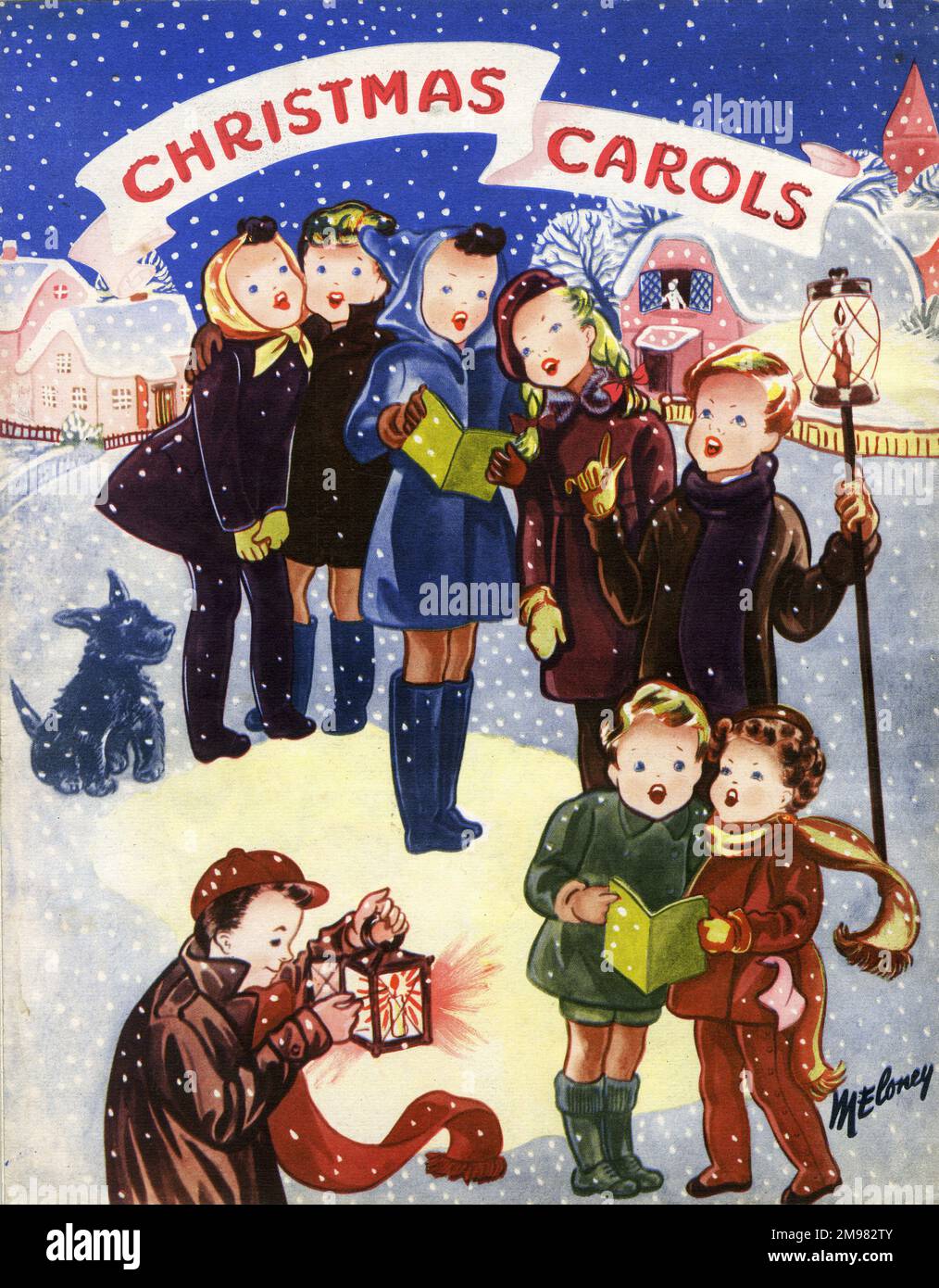 Niños cantando villancicos de Navidad. Foto de stock