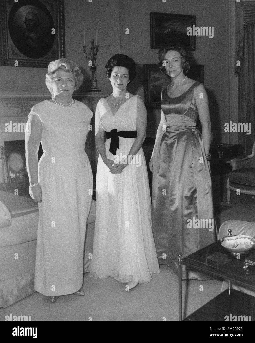 First lady, Lady Bird Johnson, center, poses with her press secretary