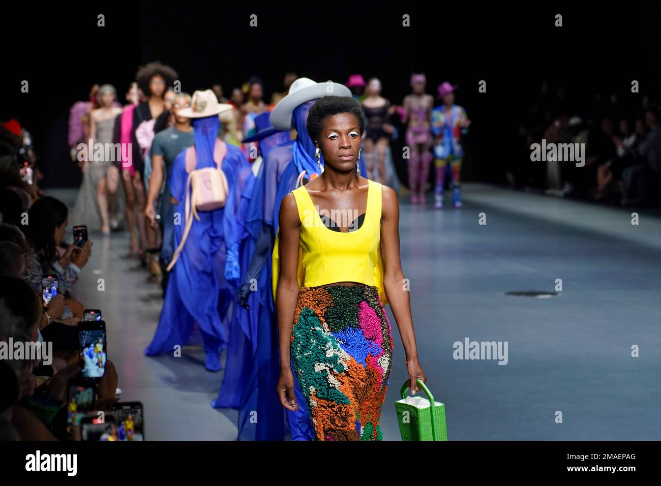 Models wear creations as part of the Stella Jean (WAMI) women's Spring  Summer 2023 collection presented in Milan, Italy, Friday, Sept. 23, 2022.  (AP Photo/Alberto Pezzali Fotografía de stock - Alamy
