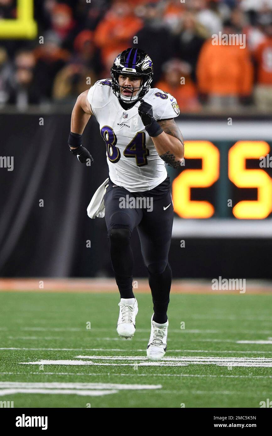 Baltimore Ravens tight end Josh Oliver (84) runs for the play during an