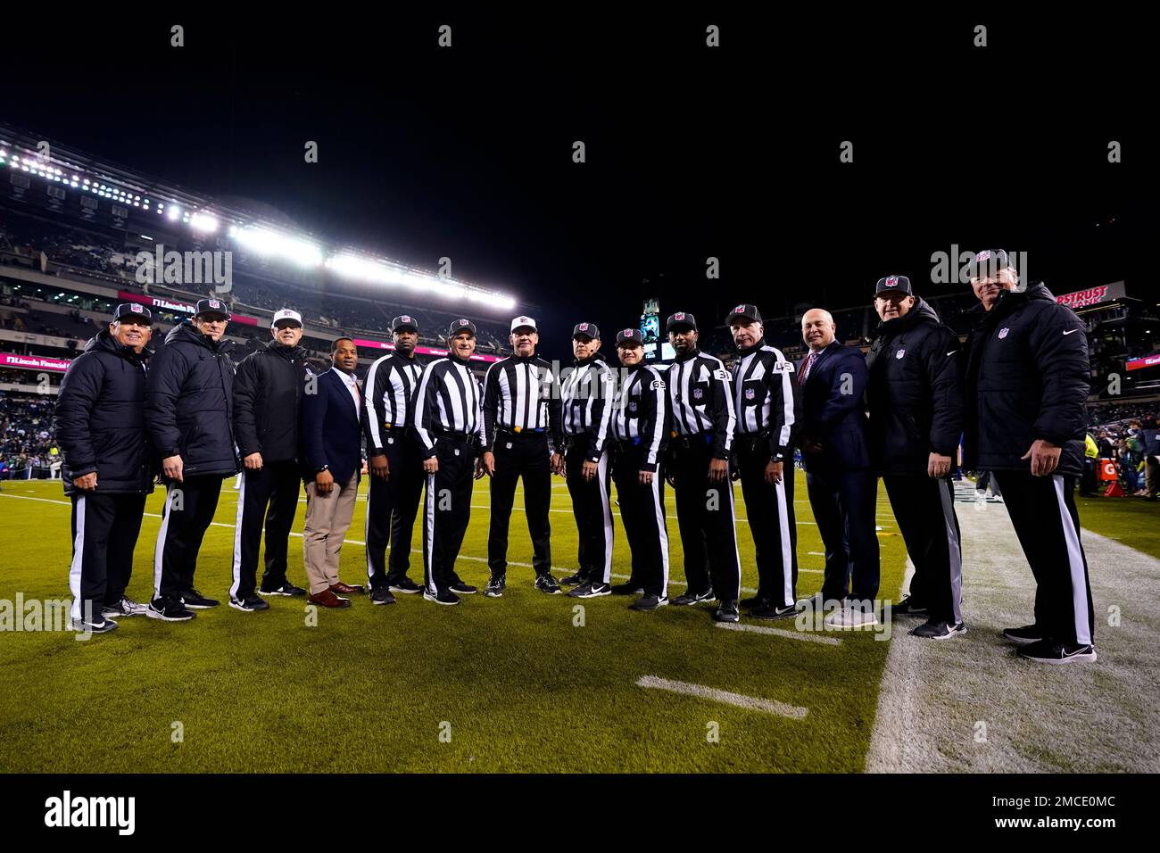 NFL officiating crew, including side judge Eugene Hall (103), umpire