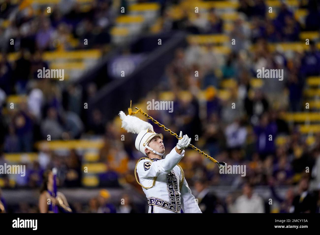 The drum major four the LSU marching band performs before an NCAA