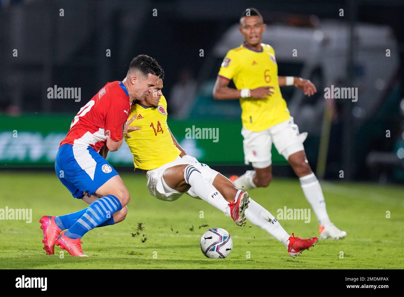 Paraguay's Morel, left, fights for the ball with Colombia's Luis