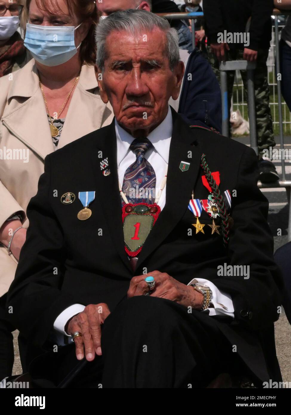 Charles Shay, right, the 96-year-old native American from Indian Island,  Maine, attends a D-Day ceremony in Carentan, Normandy, Friday, June 4,  2021. In a small Normandy town where paratroopers landed in the