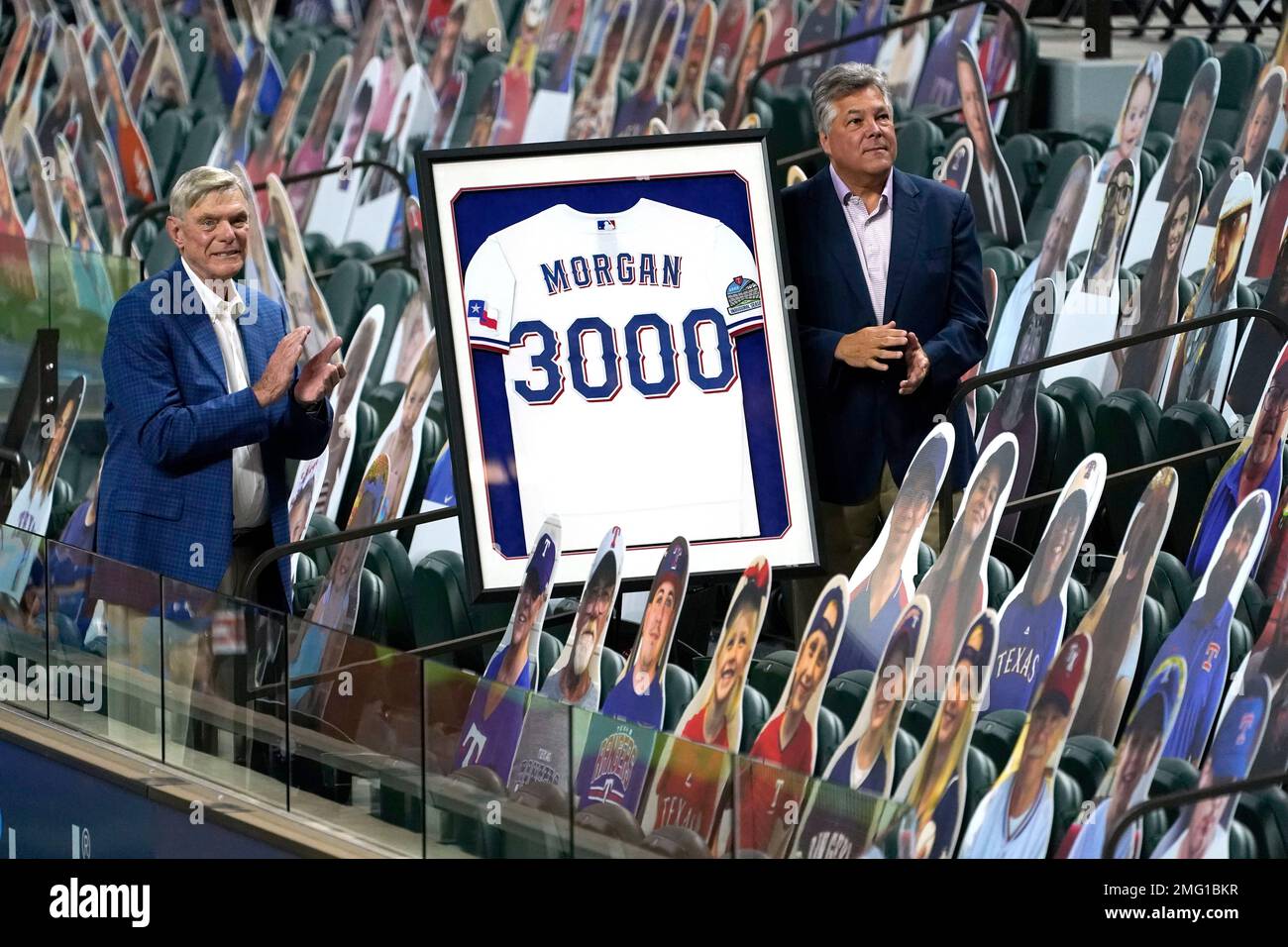 Texas Rangers owners Ray Davis, left, and Neil Leibman unveil a jersey