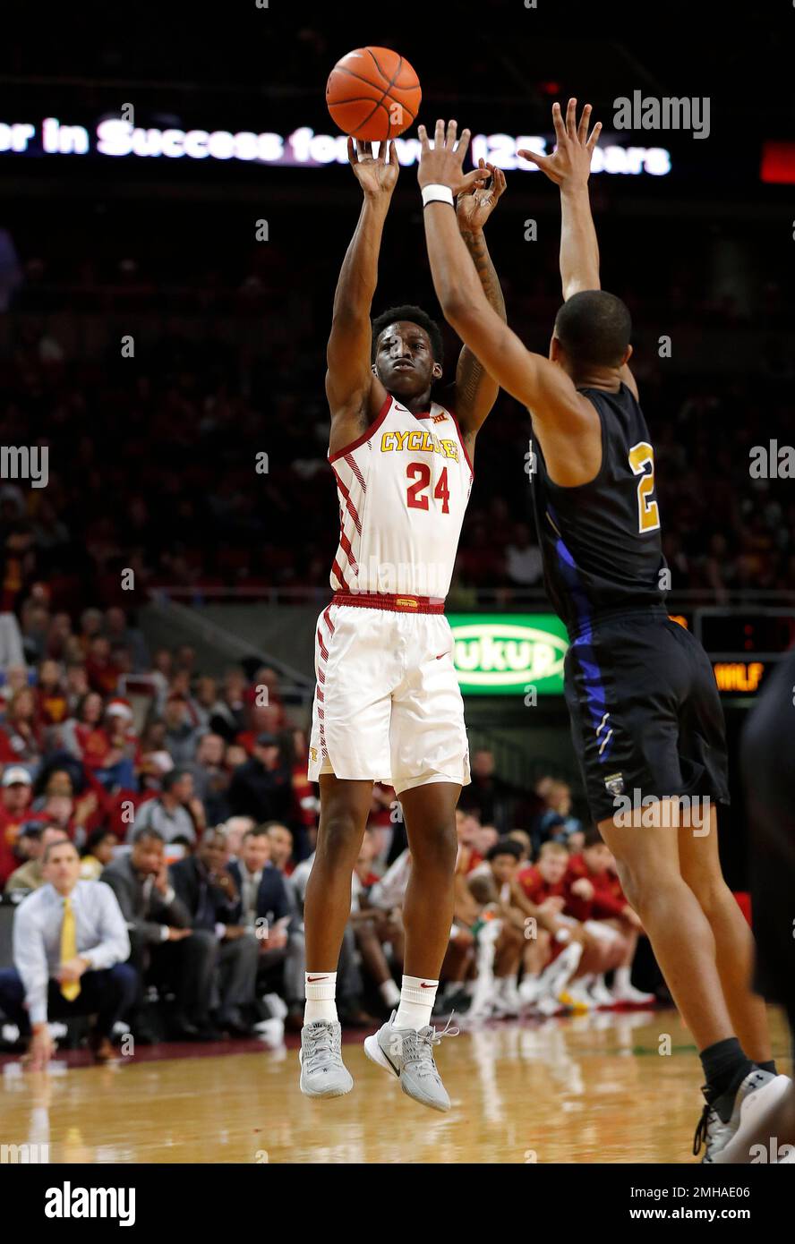 Iowa State guard Terrence Lewis (24) shoots a threepoint basket past