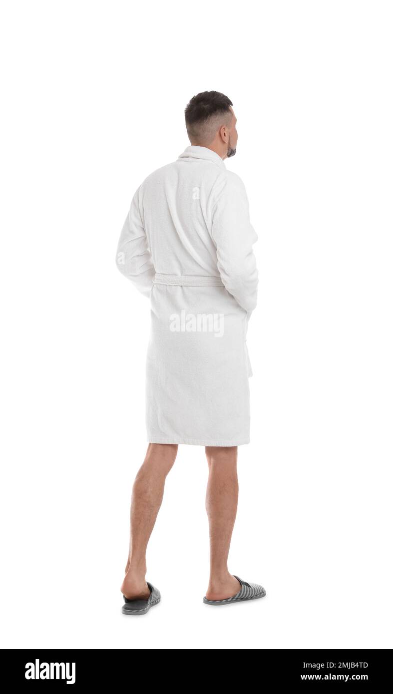 Hombre con albornoz y zapatillas sobre fondo blanco Fotografía de stock -  Alamy