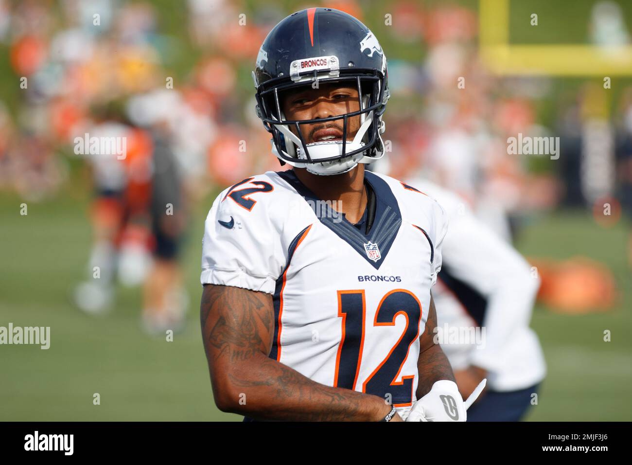 Denver Broncos wide receiver Brendan Langley (12) warms up during an NFL  training camp practice at the team's headquarters Tuesday, July 30, 2019,  in Englewood, Colo. (AP Photo/David Zalubowski Stock Photo - Alamy