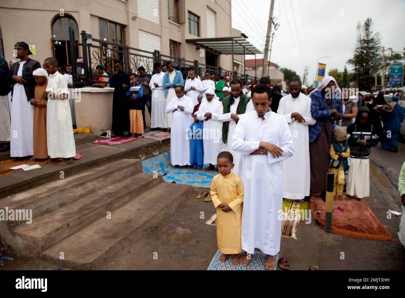 Kenyan Muslims stand for prayers outside Masjid As Salaam during the