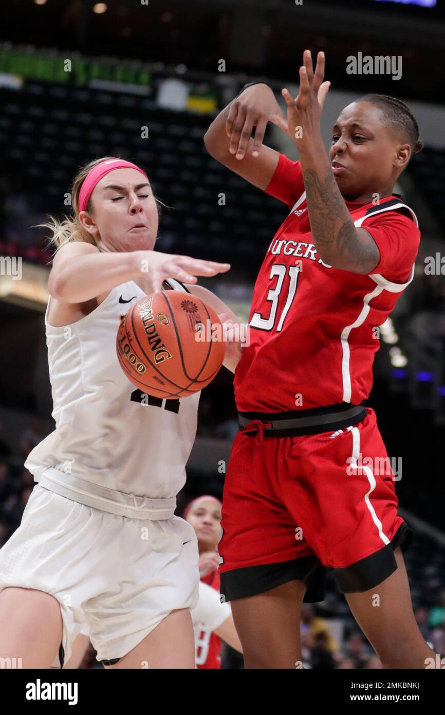 Iowa forward Hannah Stewart (21) strips the ball from Rutgers forward