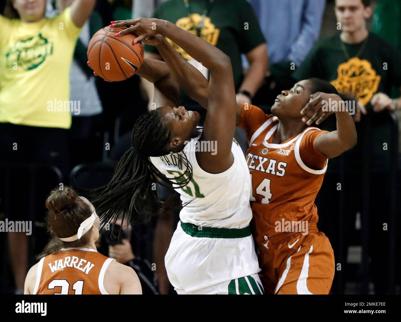 Texas guard Audrey Warren (31) watches as Baylor center Kalani Brown ...