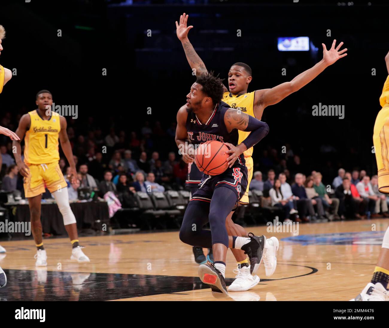 St. Johns' Shamorie Ponds drives past California's Paris Austin during