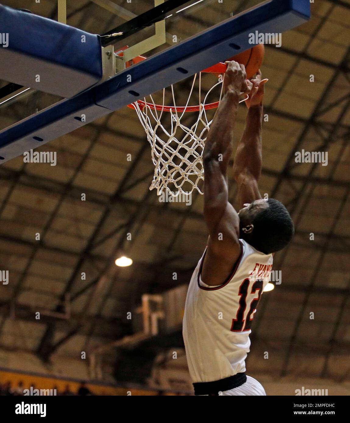 Texas Tech's Keenan Evans (12) tries to dunk the ball during the first half of an NCAA college