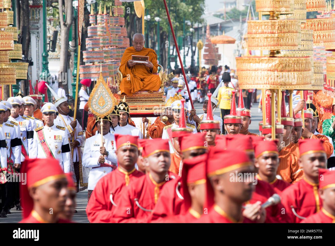 Participants walk in the funeral procession and royal cremation ceremony of late Thai King