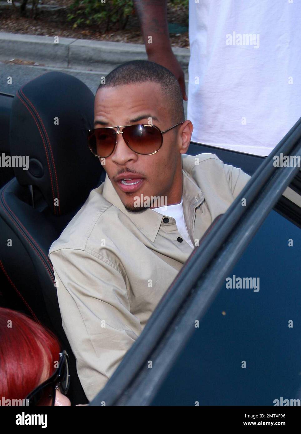 Rapper T.I. shopping at Louis Vuitton on Rodeo Drive in Beverly