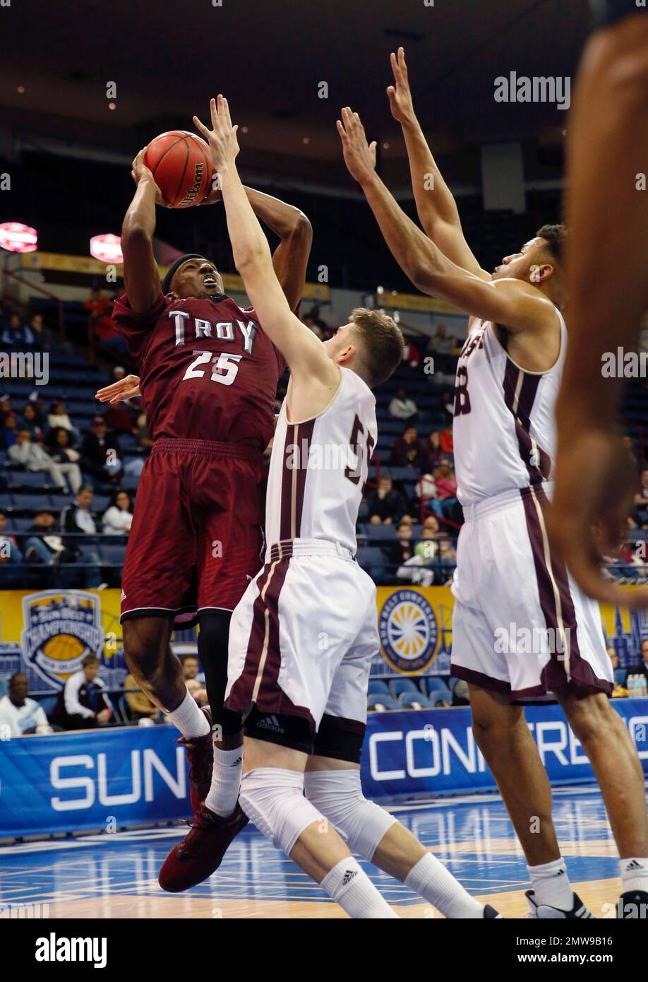 Troy forward DeVon Walker (25) shoots against Texas State forward