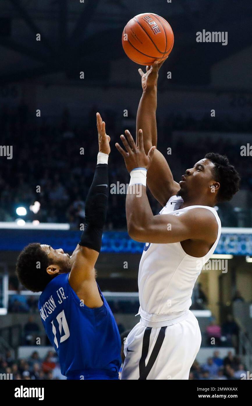 Xavier's Quentin Goodin (3) shoots over Creighton's Maurice Watson Jr