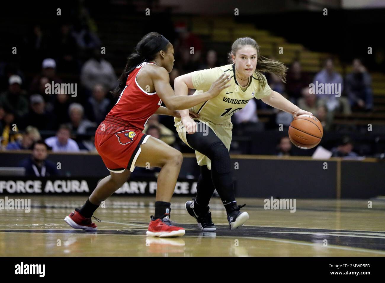 Vanderbilt guard Cierra Walker (10) plays against Louisville guard Taylor Johnson, left, in the