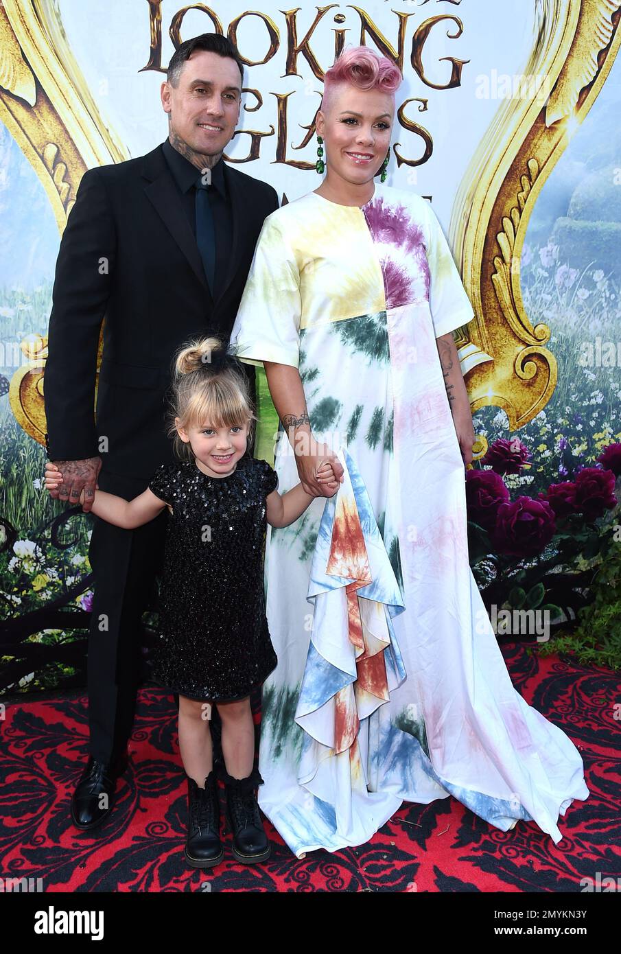 Carey Hart, from left, Willow Sage Hart and Pink arrive at the premiere