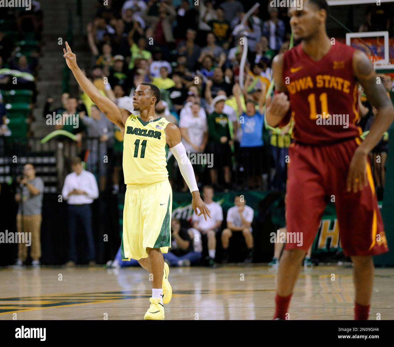 Lester Medford (11) celebrates a 3point basket as Iowa State's Monte