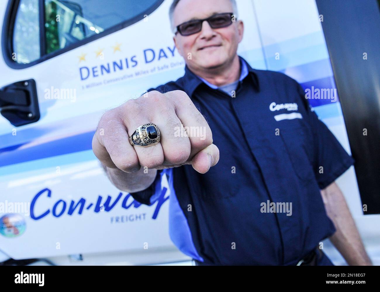Conway Freight professional driver Dennis Day shows off a ring he