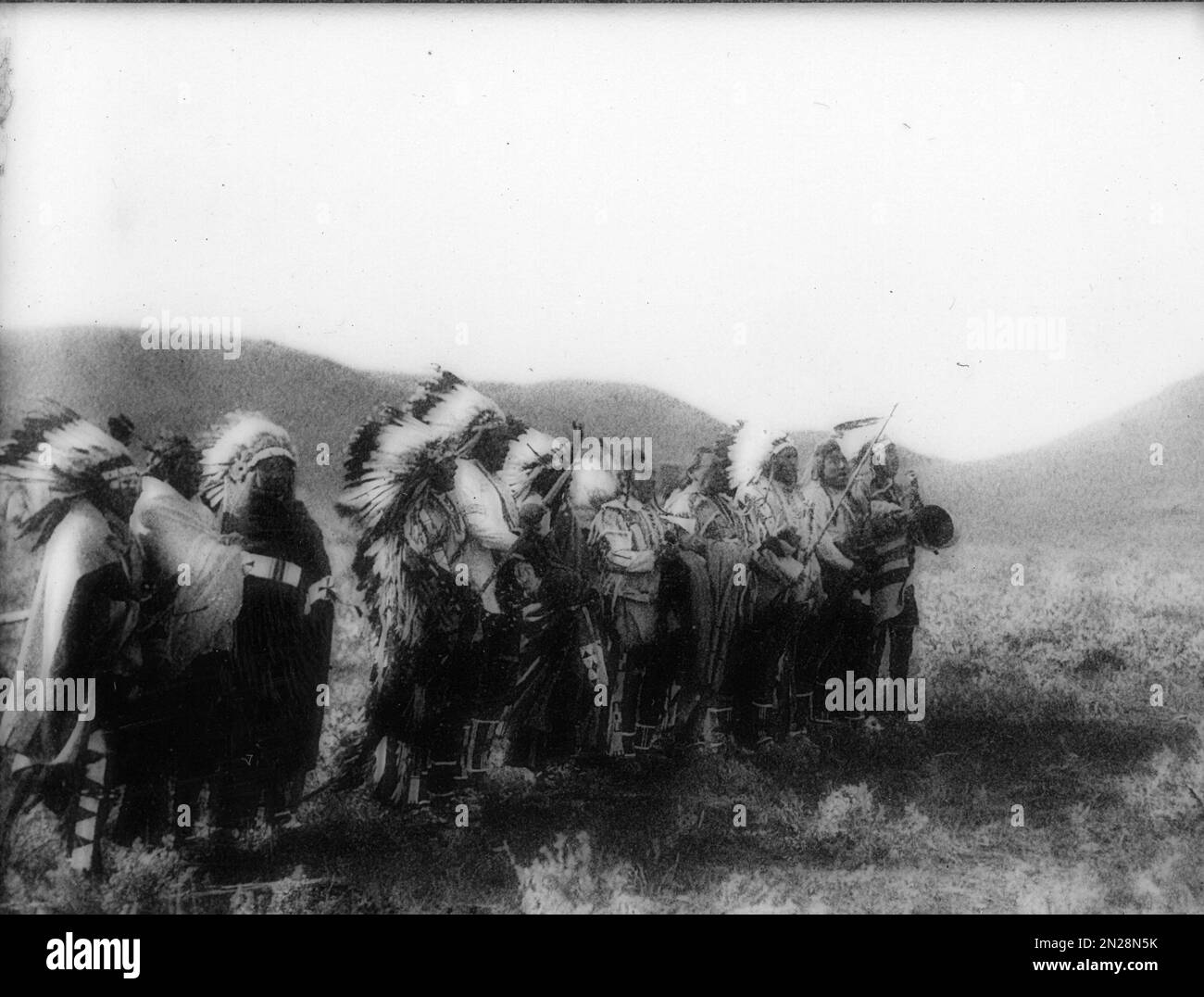 Grupo de nativos americanos en Full Regalia en el 10th aniversario de la batalla de Little Bighorn Foto de stock