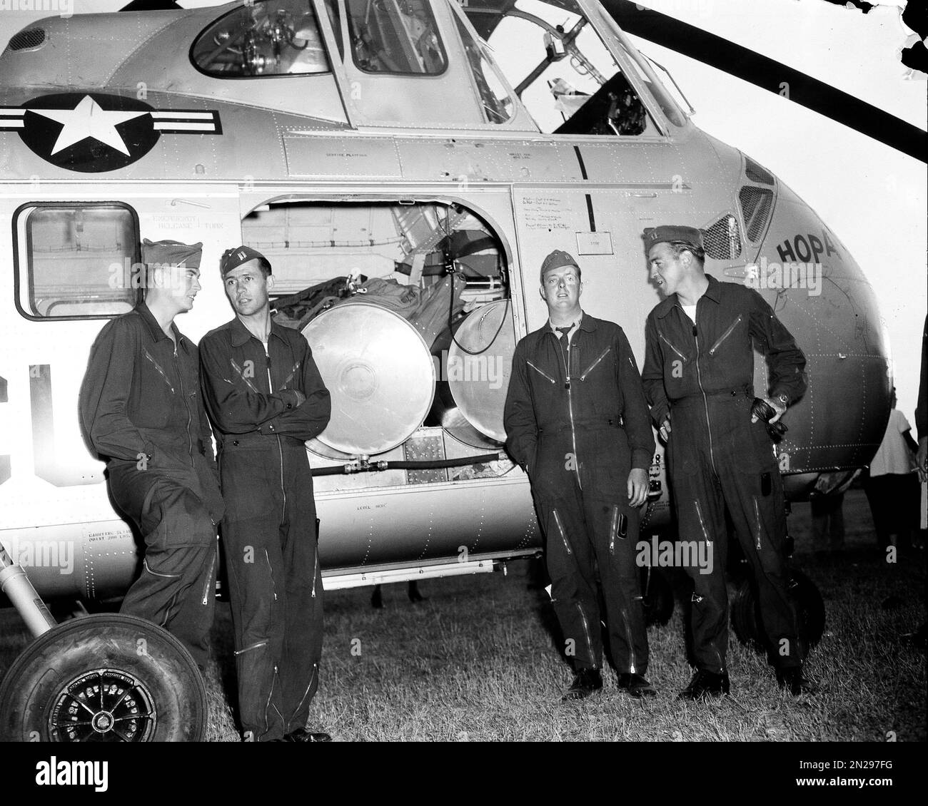 From left to right, Lt. Harold W. Moore, copilot, and D