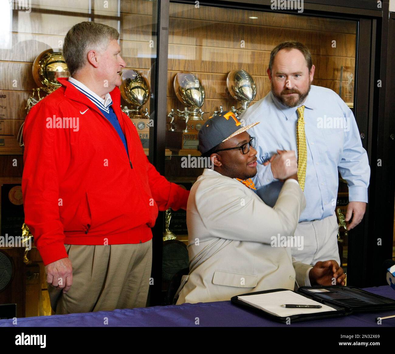 Drew Richmond, an offensive tackle, signs his national letter of intent to play football at