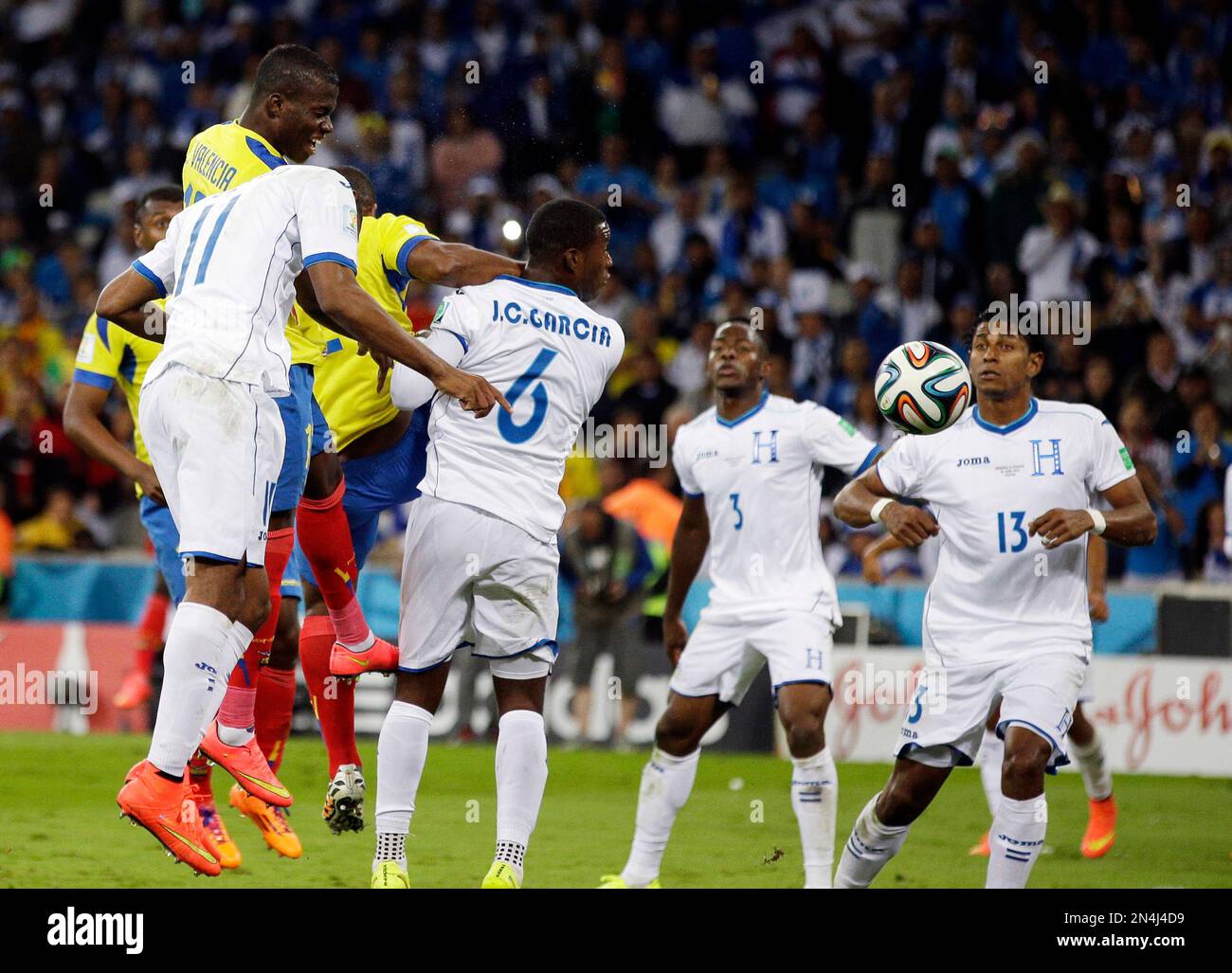 Ecuador's Enner Valencia, top left, scores his team's second goal