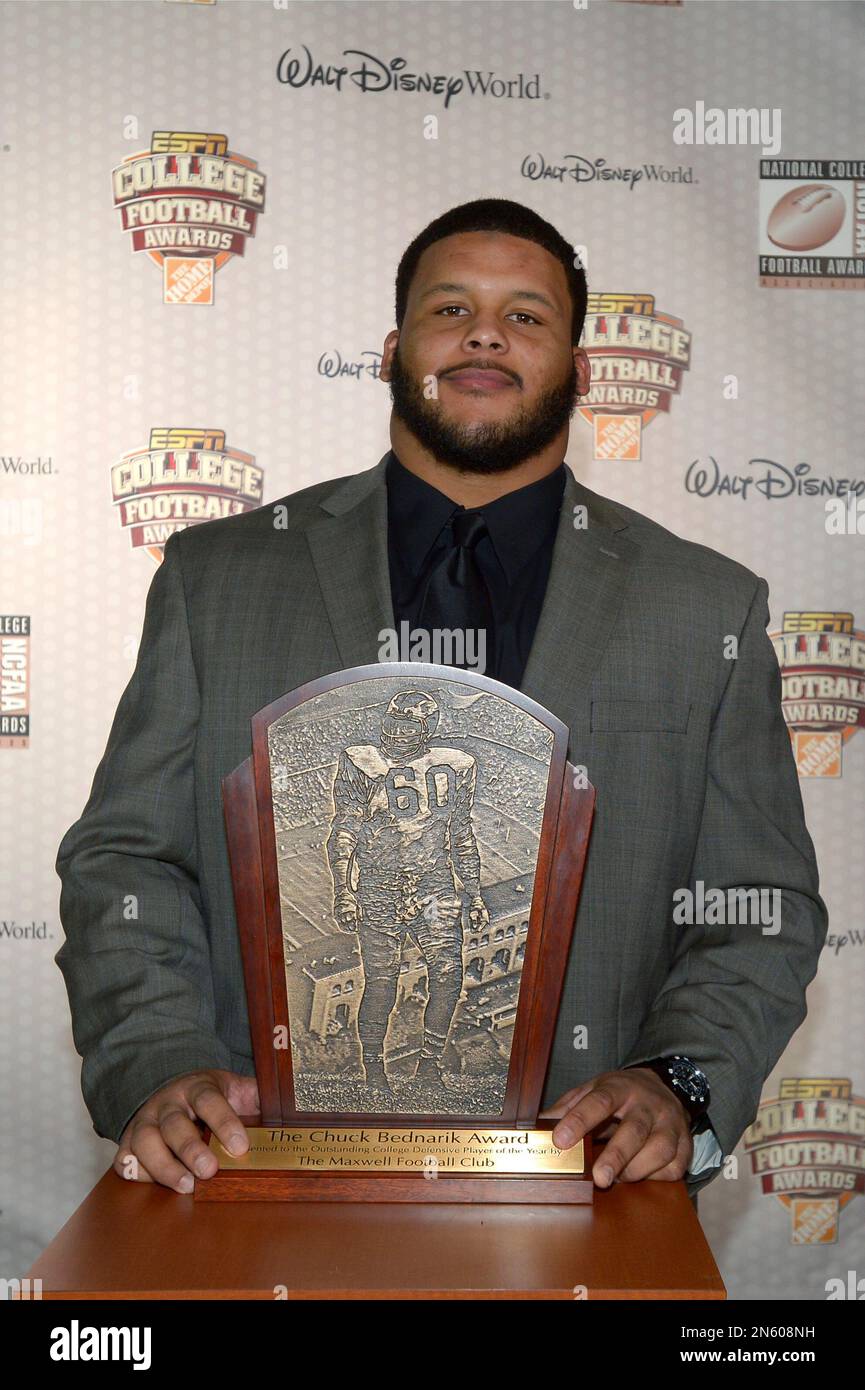 Pittsburgh defensive tackle Aaron Donald poses with the Chuck Bednarik