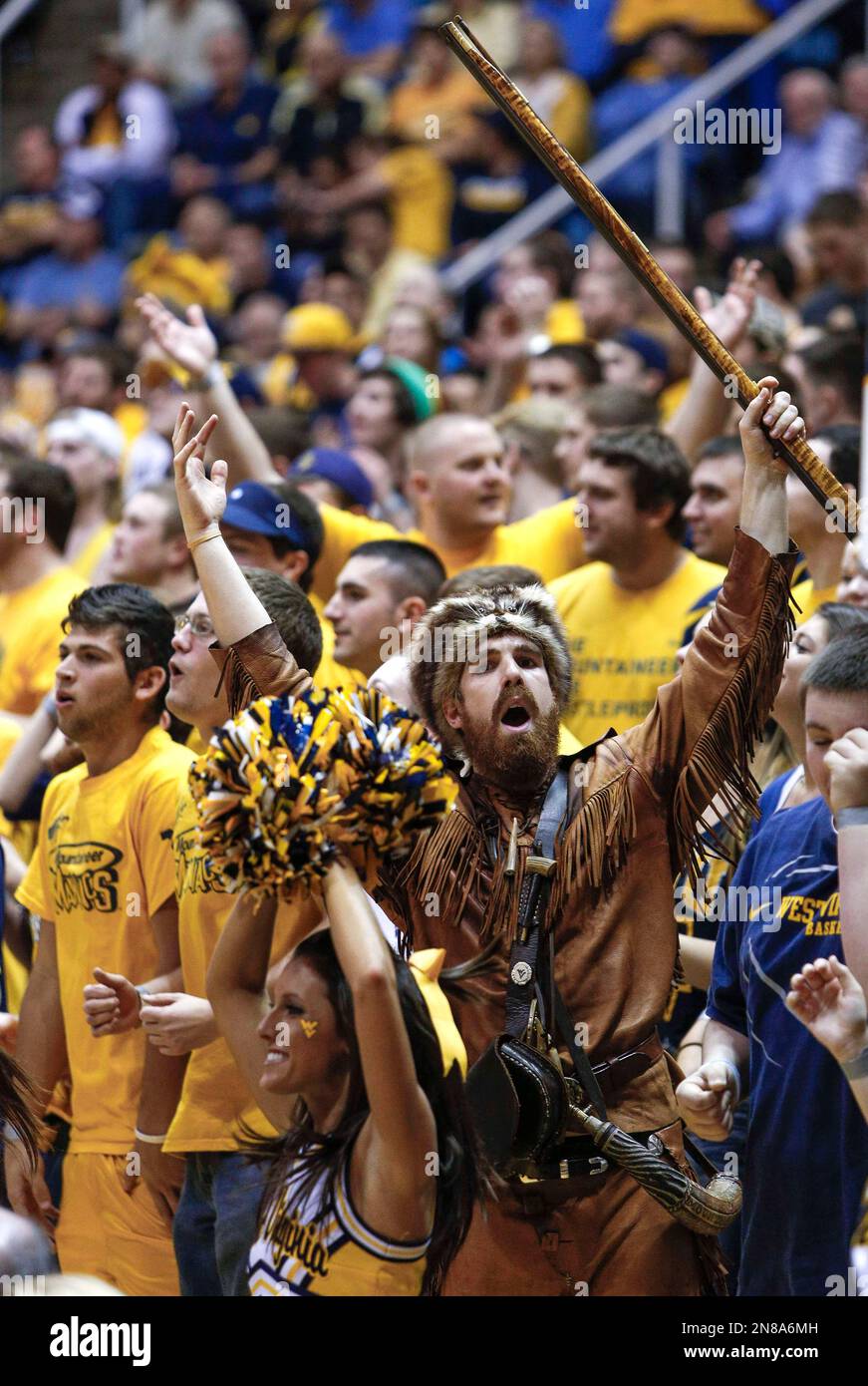The West Virginia Mountaineer mascot, Jonathan Kimble cheers during the