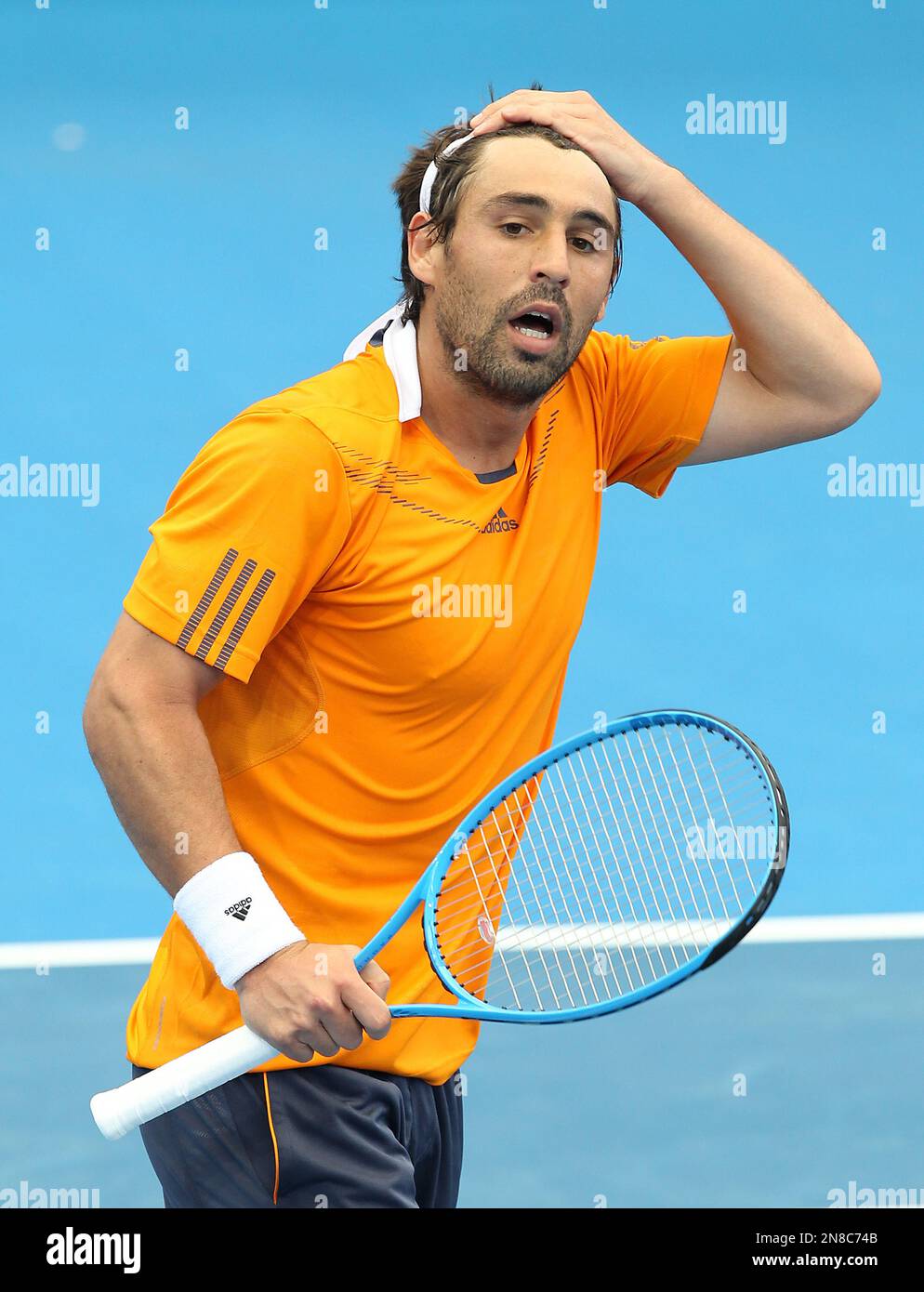 Marcos Baghdatis of Cyprus reacts after winning his quarterfinal