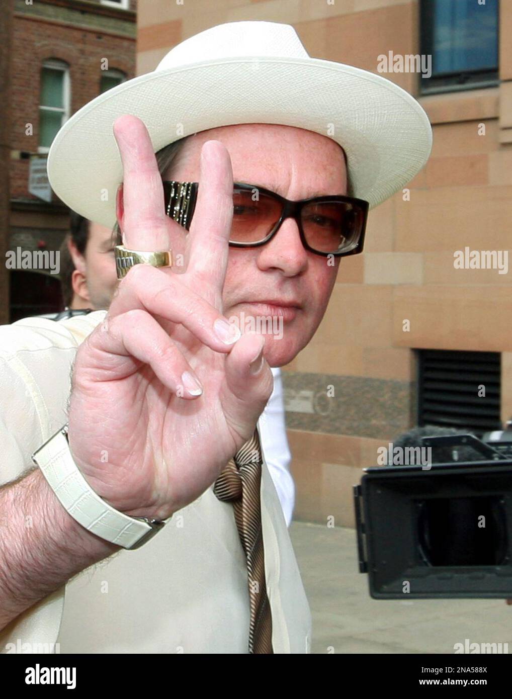 FILE Antique dealer Raymond Scott, 53, arrives for his court case at