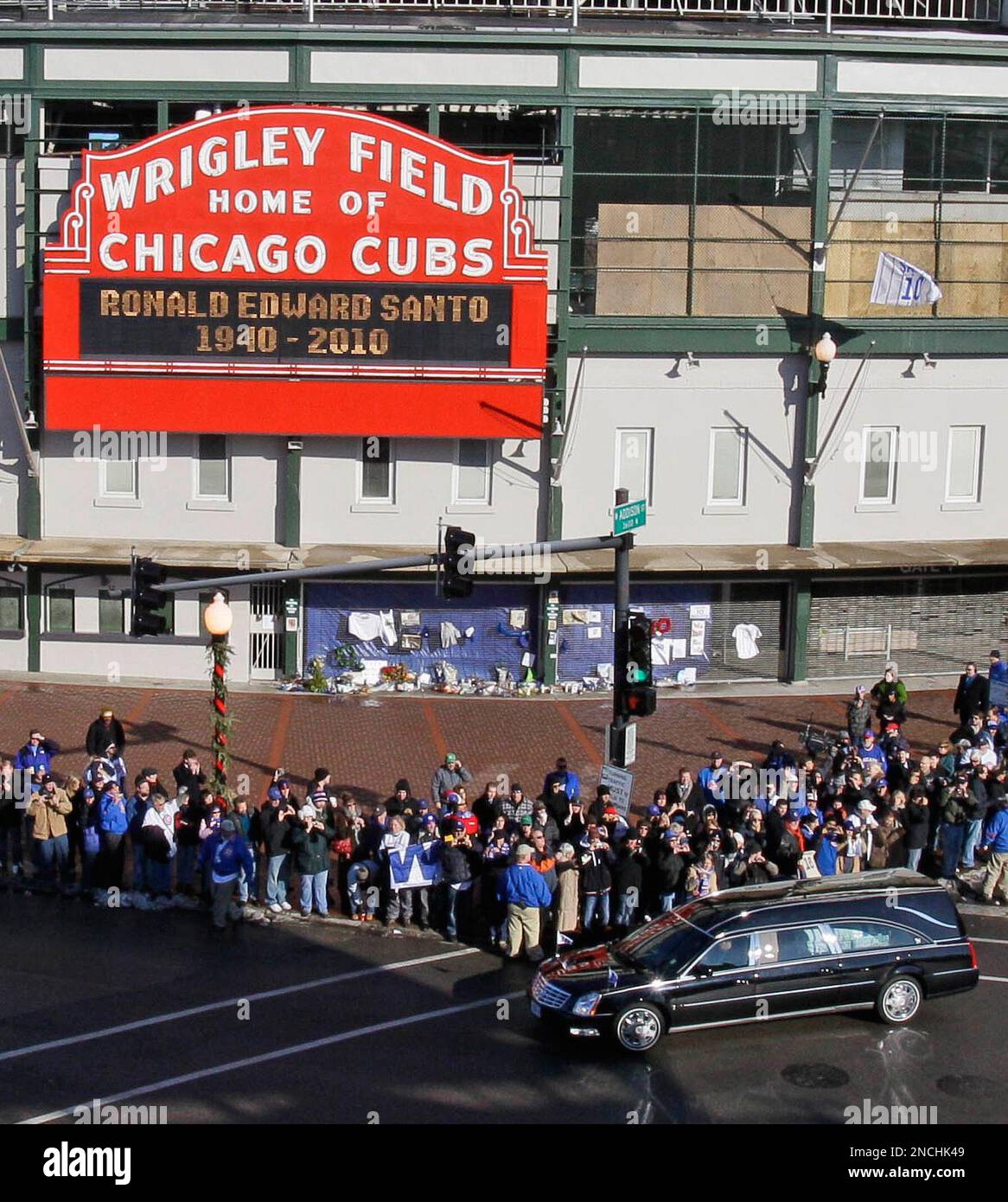 ** ALTERNATE CROP ** Baseball fans pay their respect as the funeral