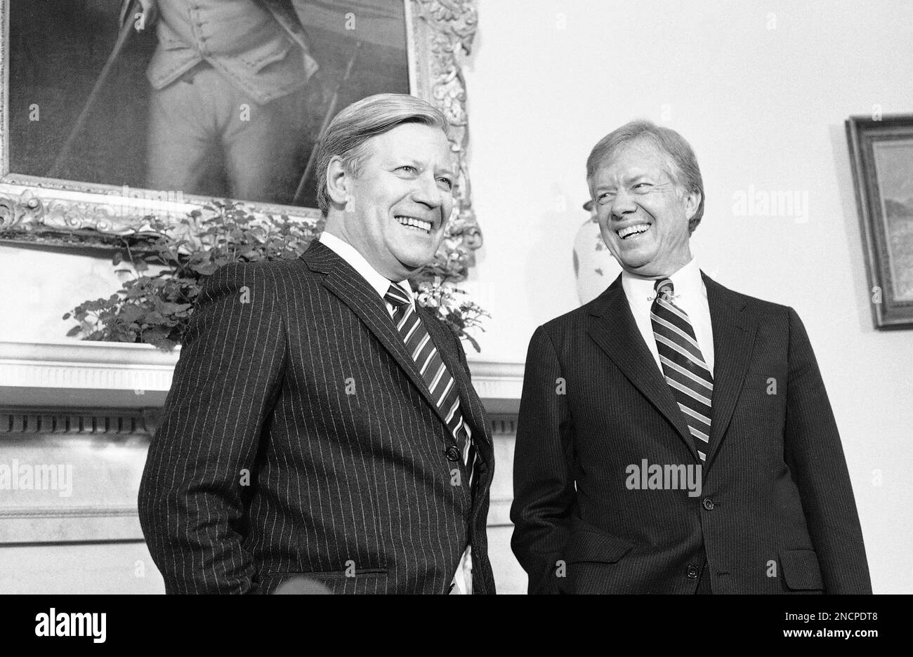 West German Chancellor Helmut Schmidt meets with President Jimmy Carter in the Oval Office of