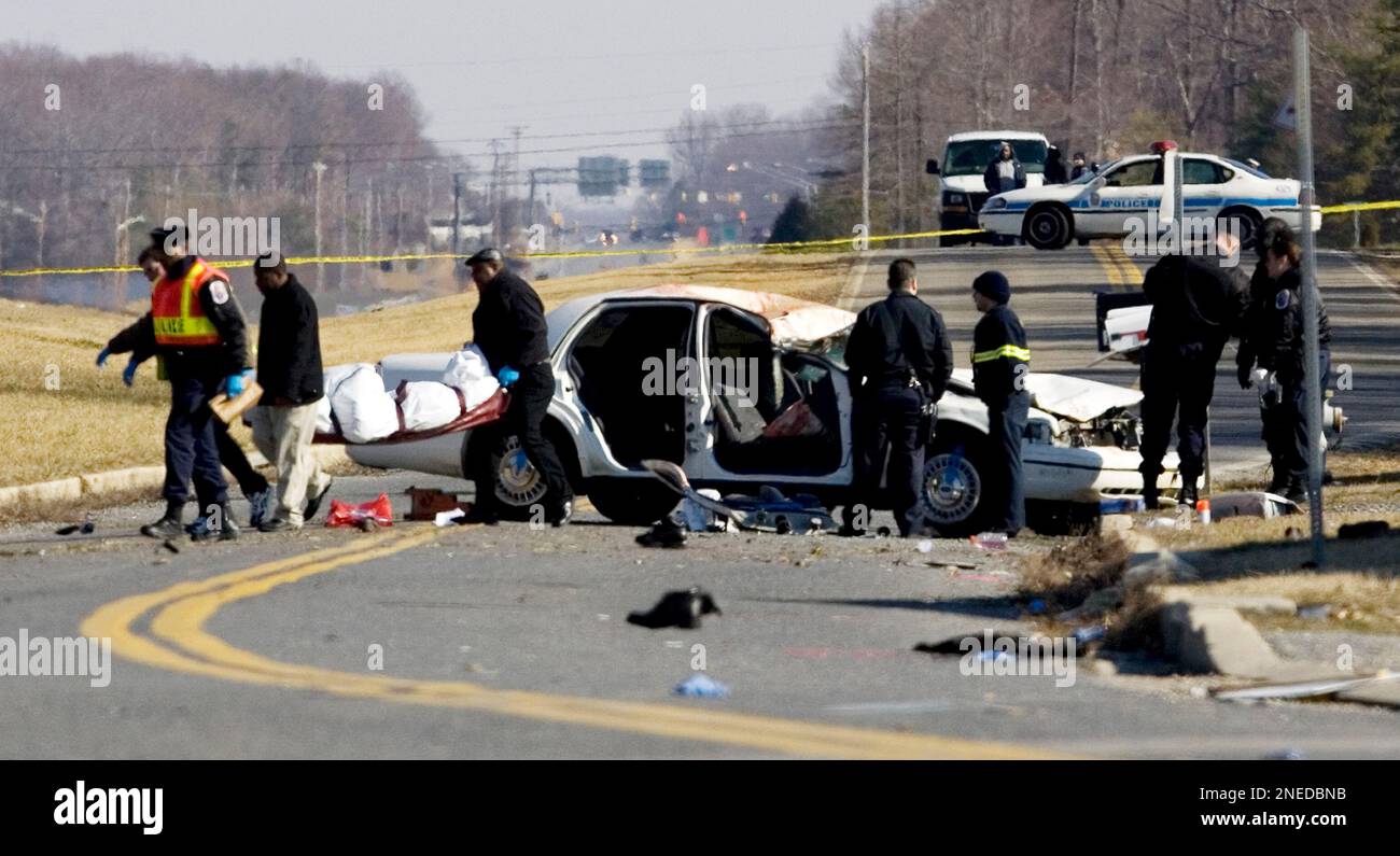 FILE This Feb. 16, 2008 file photo shows emergency personnel carrying