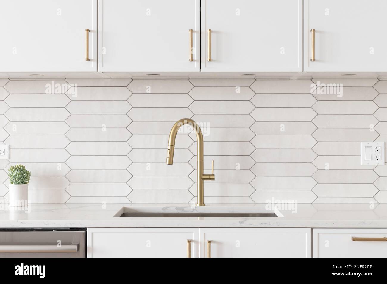 Un hermoso detalle de grifo de cocina con gabinetes blancos, un grifo de  oro, encimeras de mármol blanco y un salpicadero de azulejos de cerámica  marrón Fotografía de stock - Alamy