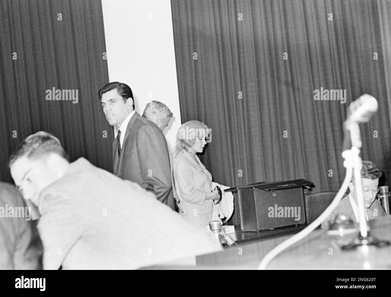 Candace Mossler, right, and Melvin Lane Powers ,go their seperate ways