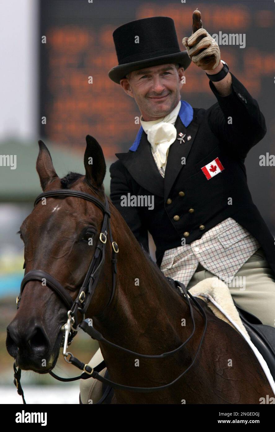 Canada's Ian Roberts waves to the crowd as he rides MataRiki as they