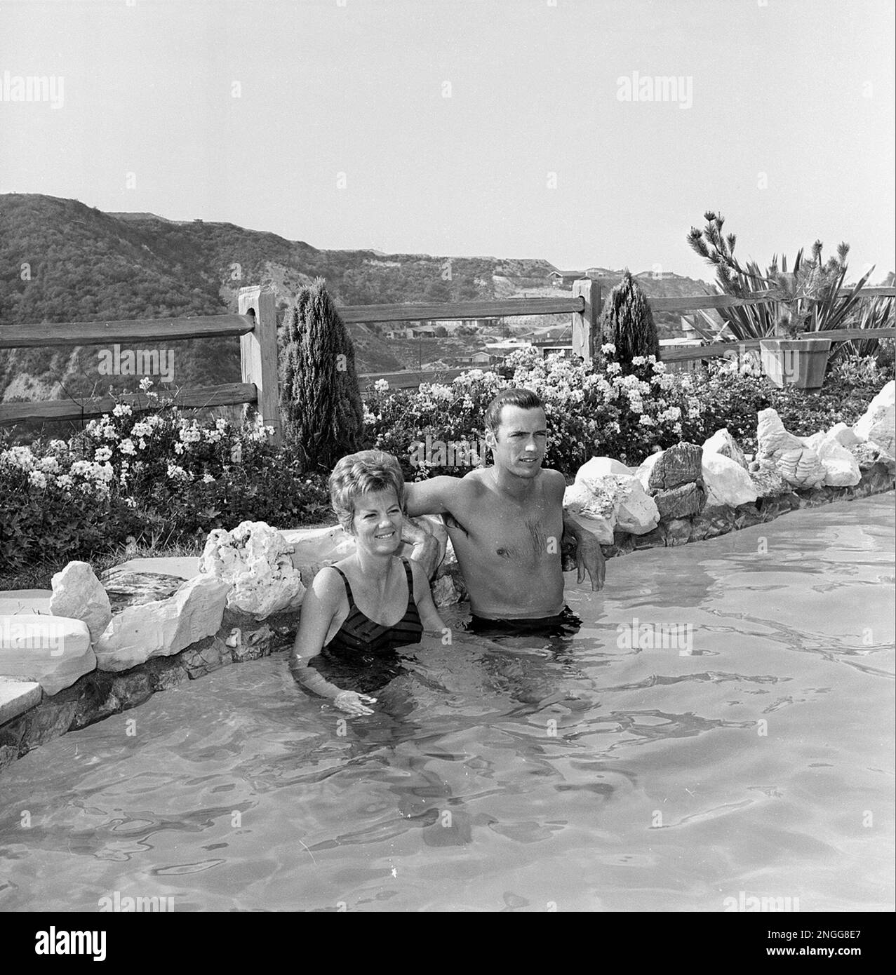 Actor Clint Eastwood and his wife, Maggie, are shown in their swimming