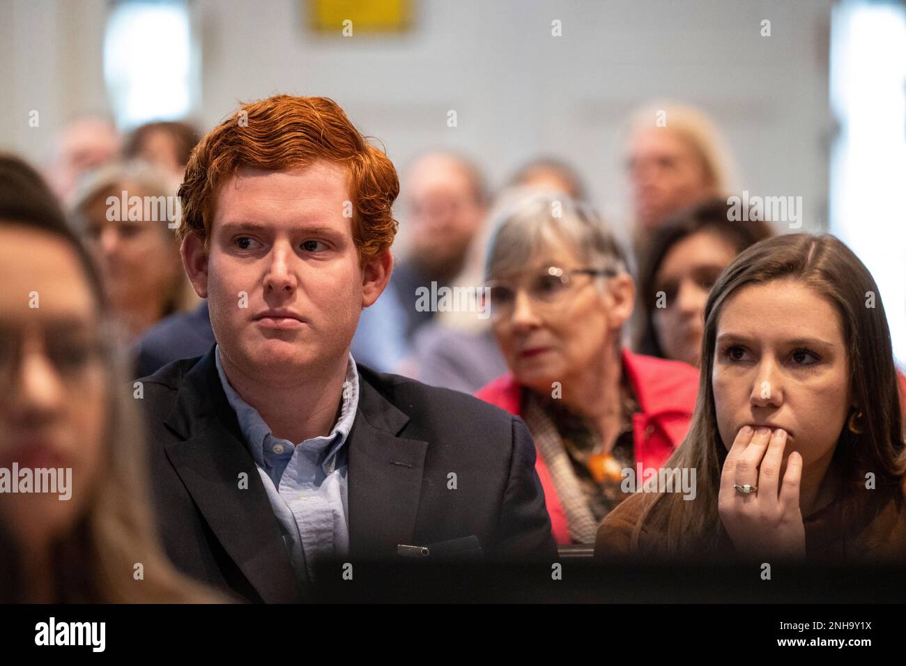 Buster Murdaugh, left, and his girlfriend Brooklynn White watch a video clip from Buster's