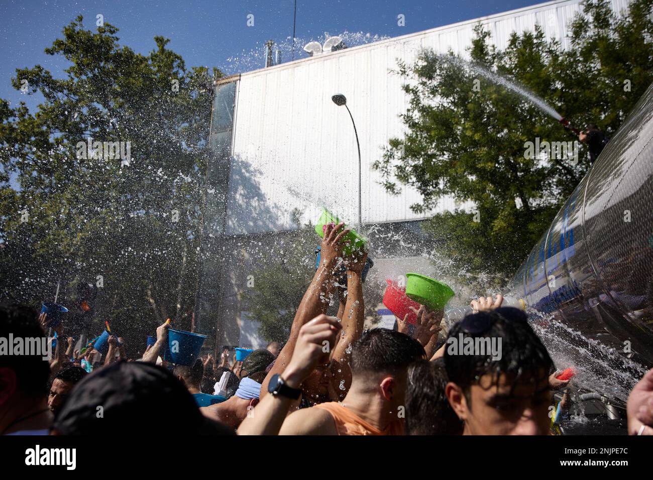 Several people enjoy the water during the celebration of the Batalla