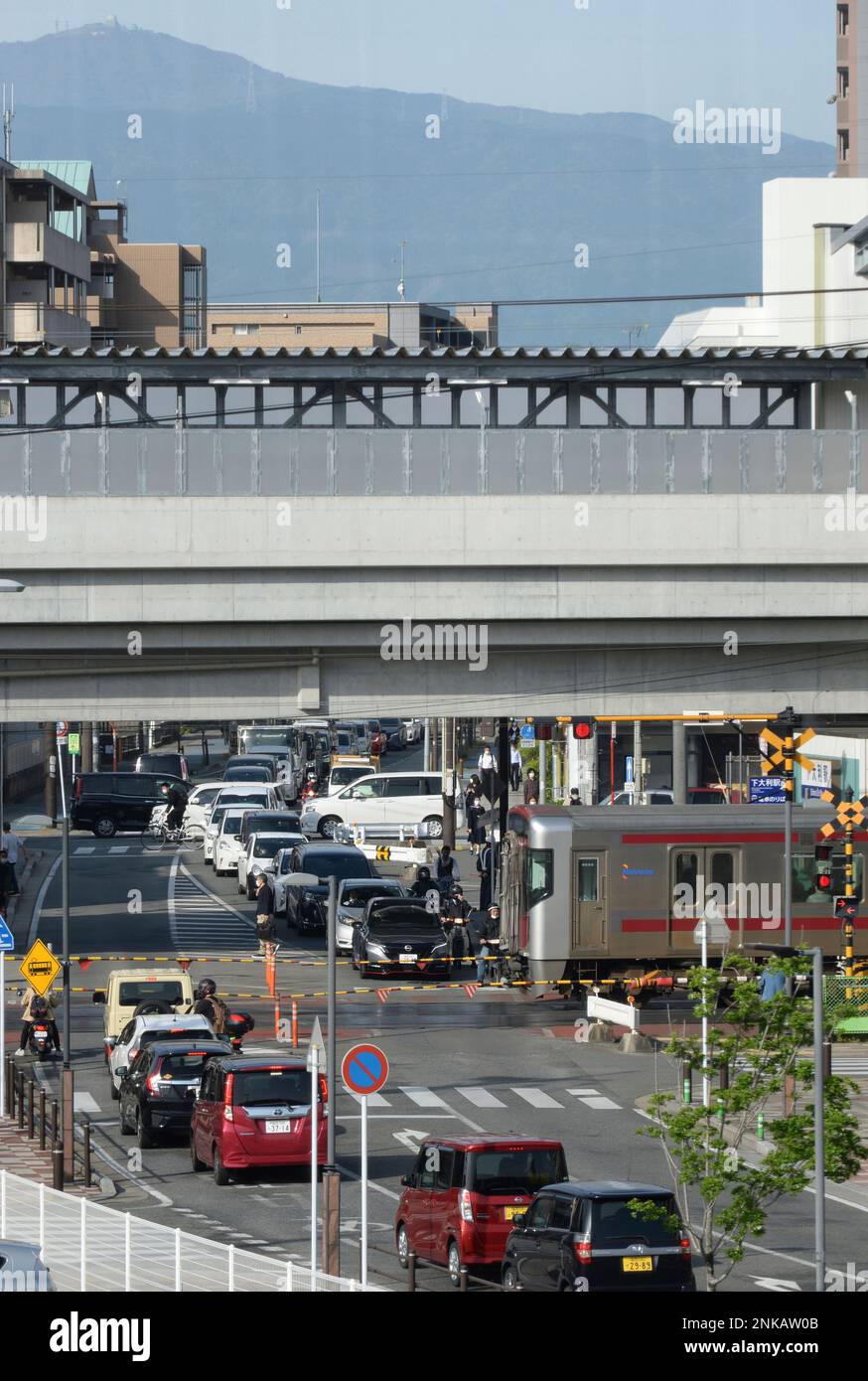 A train of NishiNippon Railroad Co., Ltd. runs in Onojo City, Fukuoka
