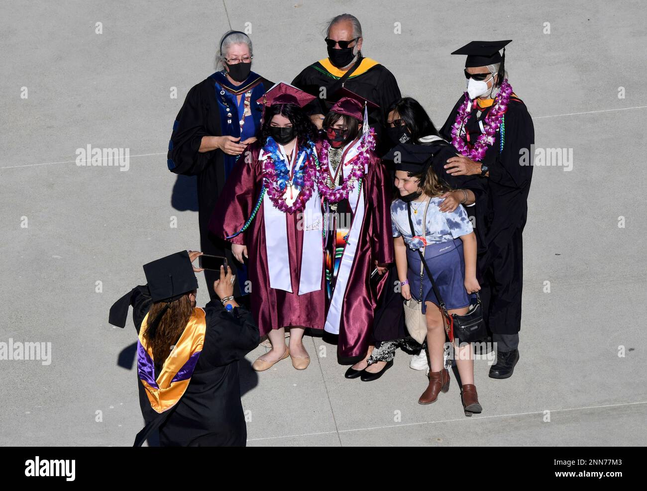 Faculty pose with students and family during the 2021 Mt. Sac